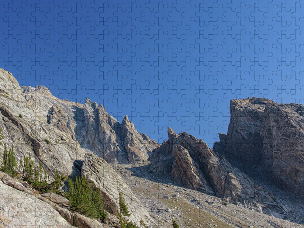 Majestic Mountain Peaks Under Blue Sky Jigsaw Puzzle