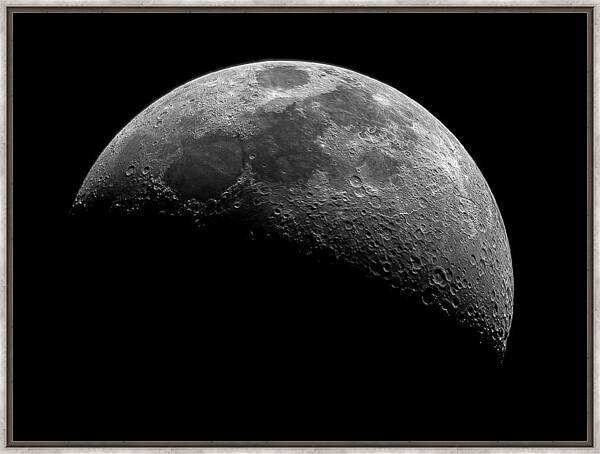 Illuminated Half Of The Moon Framed Print