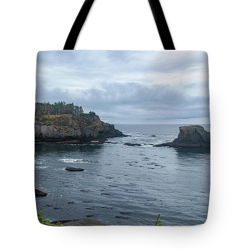 Serene Coastal Cliffs at Dawn Tote Bag