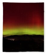 Northern Lights Over Mountain Range Fleece Blanket