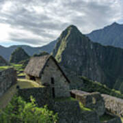 Ancient Ruins With Majestic Mountain Backdrop Poster