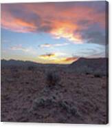 Desert Sunset Over Rugged Terrain Canvas Print