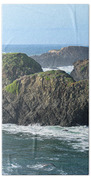 Majestic Coastal Rock Formations Beach Towel