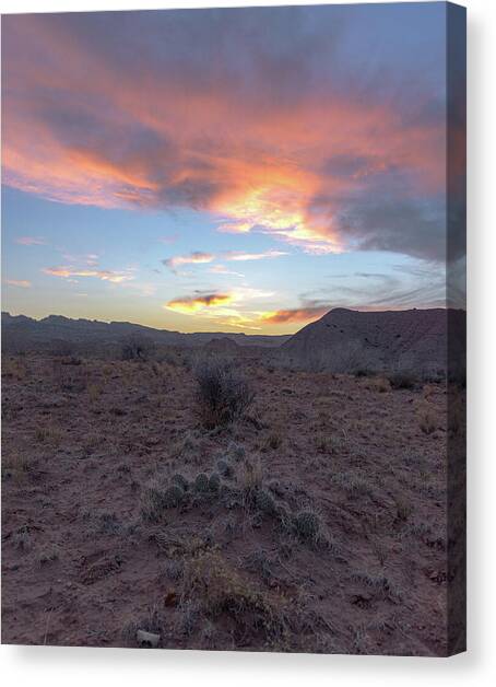 Desert Sunset Over Rugged Terrain Canvas Art Print by Brandon Wichmann