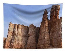 Majestic Rock Formations Under Blue Sky In Bryce Canyon National Park Tapestry