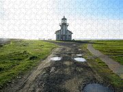 Lighthouse Under A Bright Sky Jigsaw Puzzle
